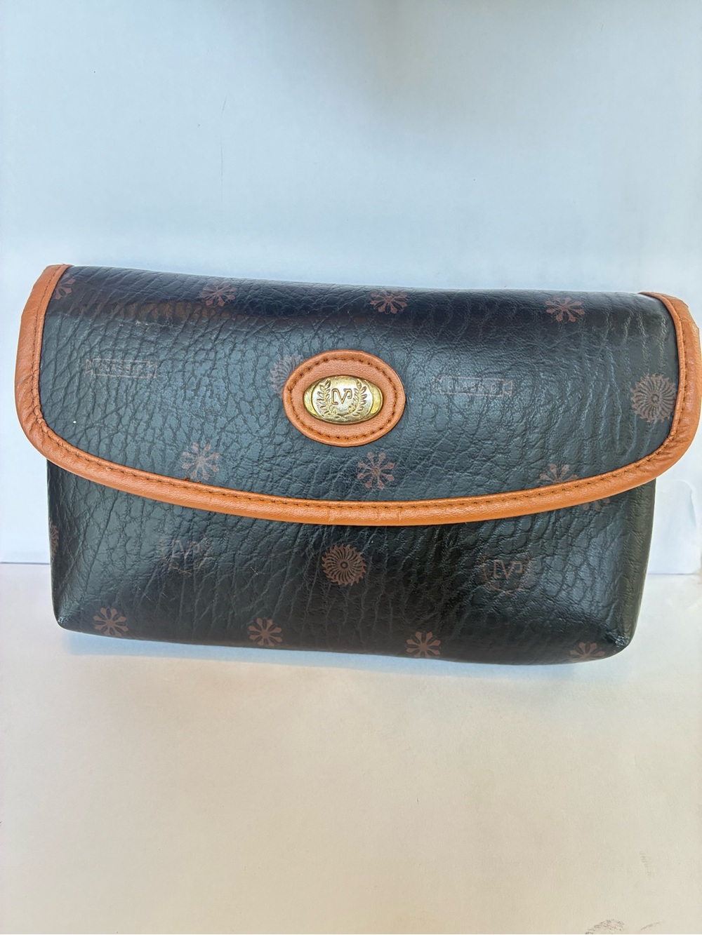 Black and Tan Floral-Print Wristlet Clutch with Gold-Tone Emblem